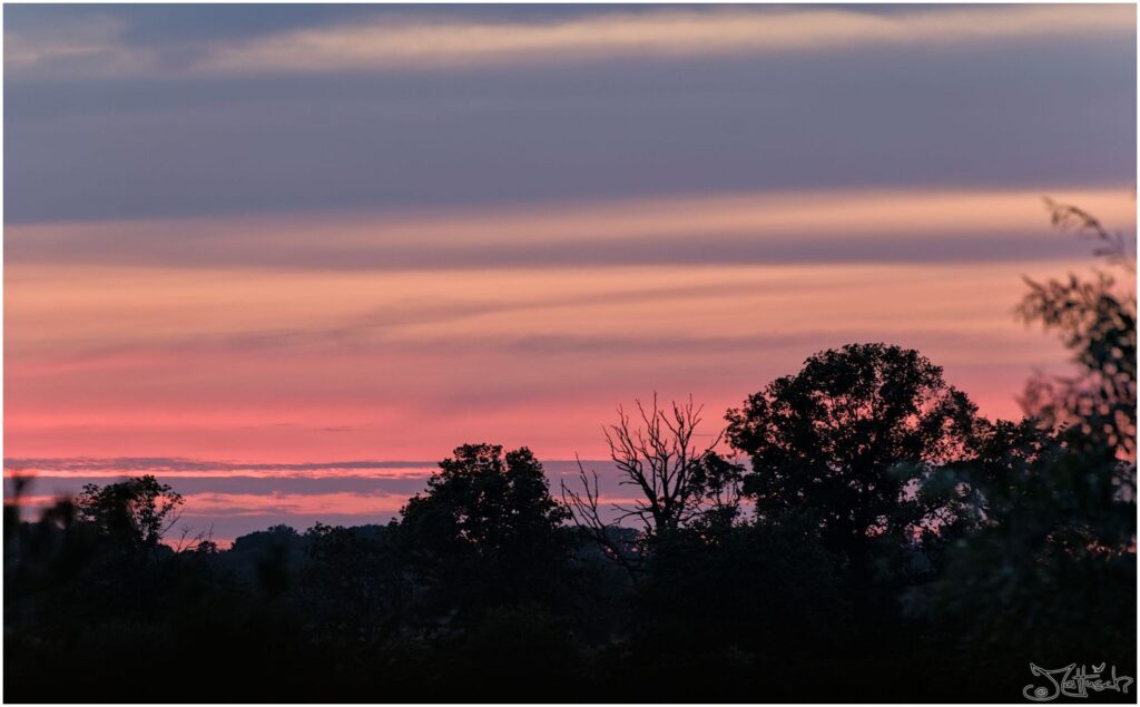 Wolkenhimmel bei Sonnenuntergang