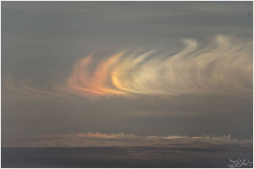 Wolkenhimmel mit Prismeneffekt